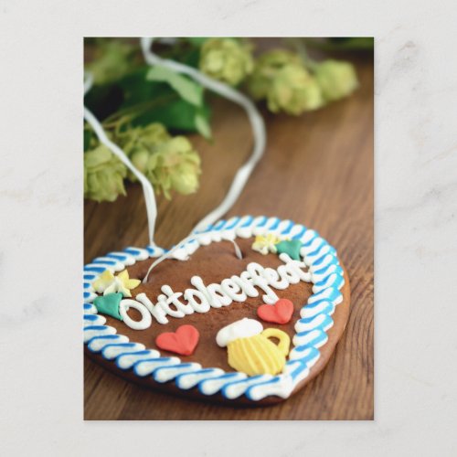 Oktoberfest Gingerbread heart on table with hop Postcard