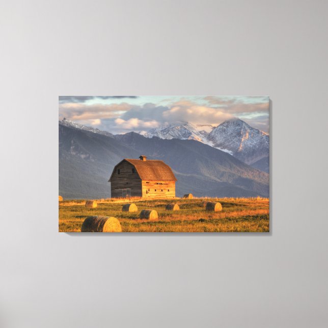 Old barn framed by hay bales and dramatic canvas print (Front)