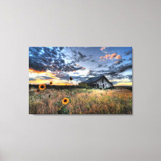 Old Barn on the Prairie with Sunflowers Canvas Print