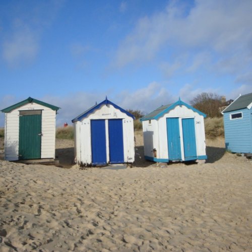 old beach huts and blue sky English seaside photo Jigsaw Puzzle