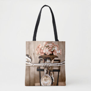 Old bicycle and flowers blur in background process tote bag