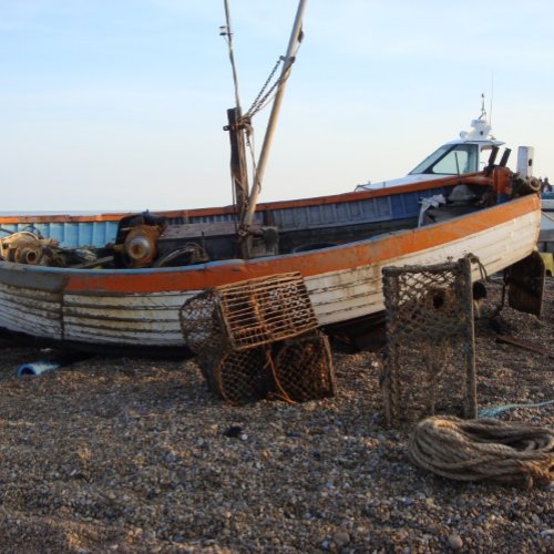 old boat on beach with lobster pots seaside photo jigsaw puzzle