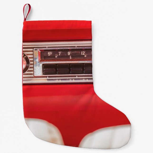 Old car radio inside a red classic American car wi Small Christmas Stocking (Front)