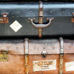 OLD ENGLAND TEAPOT<br><div class="desc">Old suitcases from the 1940's stacked on the railway station platform ready to be collected by the owners. England UK.</div>