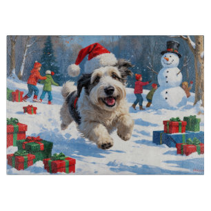 Old English Sheepdog Running in Snow Christmas Hat Cutting Board