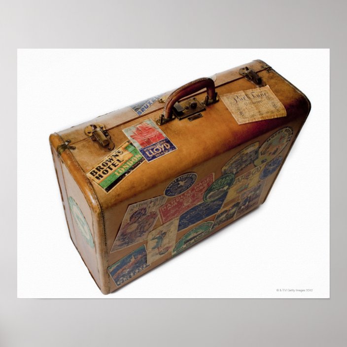 old suitcase with travel stickers