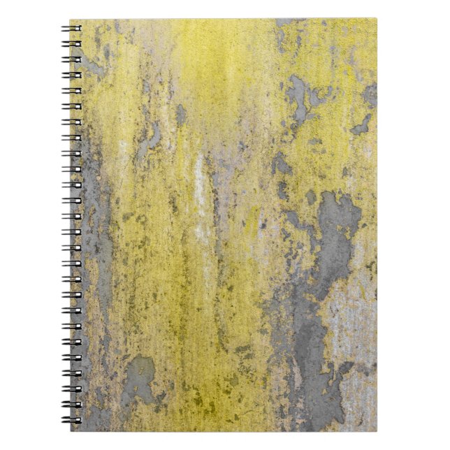 Old gray concrete wall with peeling yellow paint.  notebook (Front)
