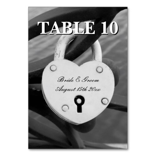 Old iron heart shaped lock photo wedding table number