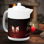 Old Lantern Light Merry Christmas Script Family Teapot<br><div class="desc">Old Lantern Light Merry Christmas Script Family teapot. Old rustic light lantern in the festive holiday mood with white script. Add your name and year.</div>