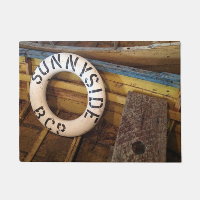 Old Life Preserver In An Abandoned Cannery Doormat (Front)