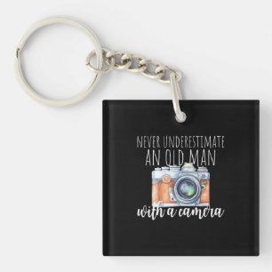 Old Man With A Camera Keychain