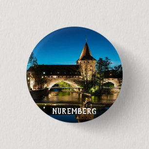 Old medieval bridge at night in Nuremberg Button