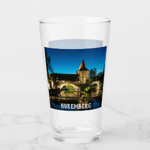 Old medieval bridge at night in Nuremberg Glass