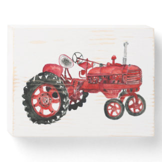 Old red tractor drawing wooden box sign