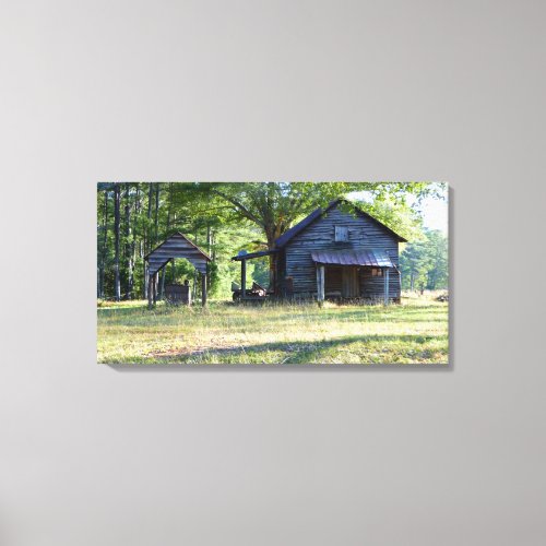 Old Rustic Cabin with well photo Canvas Print