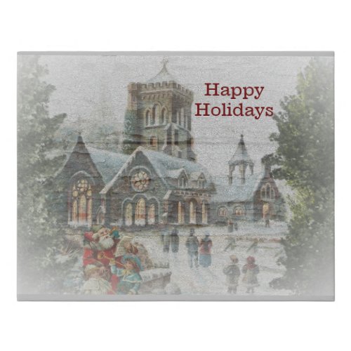 Old time Santa with children in front of a church  Faux Canvas Print