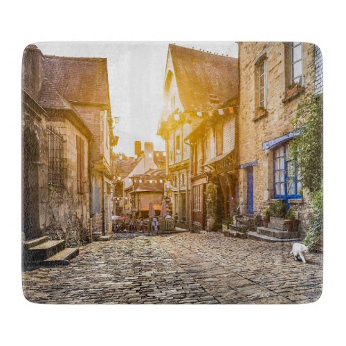 Old town in Europe at sunset Cutting Board