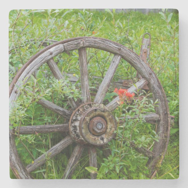 Old wagon wheel in historic old gold town 3 stone coaster (Front)