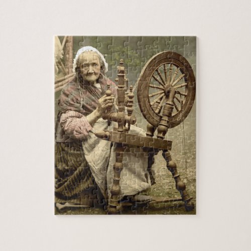 Old Woman With Spinning Wheel Jigsaw Puzzle