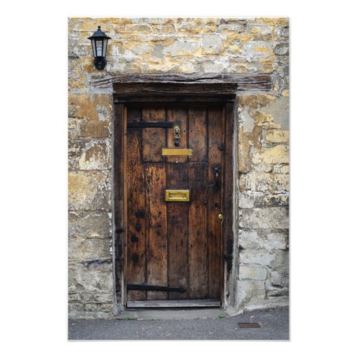 Old wooden front door with light photo print