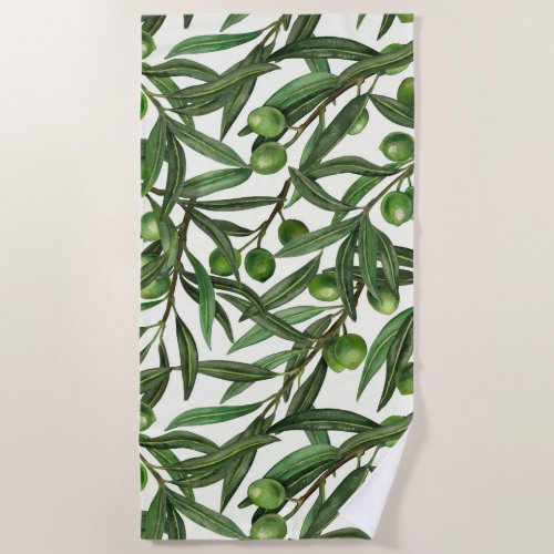 Olive branches on off white beach towel
