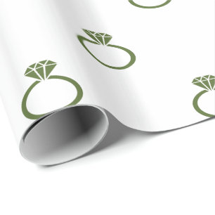 Olive Engagement Rings on White Wrapping Paper
