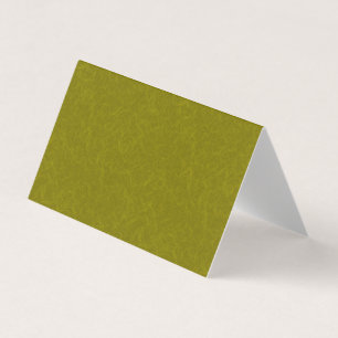 Olive green surface with subtle swirling pattern business card