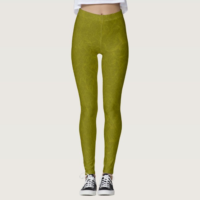 Olive green surface with subtle swirling pattern leggings (Front)