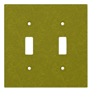 Olive green surface with subtle swirling pattern light switch cover