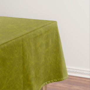 Olive green surface with subtle swirling pattern tablecloth