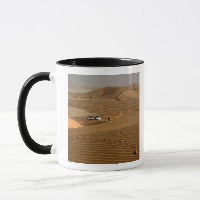 Oman, Rub Al Khali desert, driving on the dunes Mug (Left)