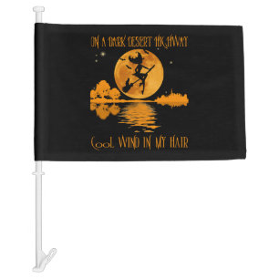 On A Dark Desert Highway witch Car Flag