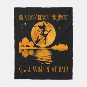 On A Dark Desert Highway witch Fleece Blanket