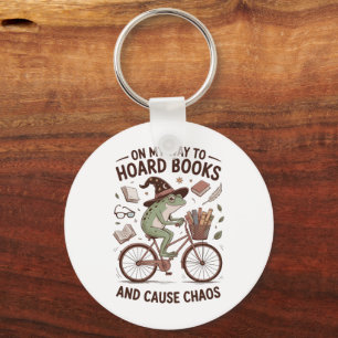 On My Way To Hoard Books And Cause Chos Frog Funny Keychain
