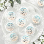 On The Beach Wedding Life Saver® Mints<br><div class="desc">These custom Life Saver mint favors feature a calming seaside watercolor design printed on a sticker placed on the clear sleeve in soft shades of blue and tan, capturing the serene, coastal feel of the ocean meeting the shore. “On The Beach” is displayed in flowing script at the center, while...</div>