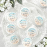 On The Beach Wedding Life Saver® Mints<br><div class="desc">These custom Life Saver mint favors feature a calming seaside watercolor design printed on a sticker placed on the clear sleeve in soft shades of blue and tan, capturing the serene, coastal feel of the ocean meeting the shore. “On The Beach” is displayed in flowing script at the center, while...</div>