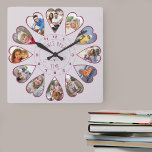Once Upon a Time 12 Heart Shaped Photos Pink Square Wall Clock<br><div class="desc">Create your own multi photo clock to tell your story - the center of the clock face is lettered with "Once upon a time" in handwritten typography. Use the photo template to add 12 of your favorite photos, which will be displayed in heart shaped frames. The design uses portrait vertical...</div>