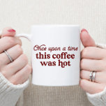 Once Upon a Time This Coffee Was Hot Mug<br><div class="desc">This mug features a witty message that reads "Once upon a time, this coffee was hot." Perfect for those who love to start their day with a smile and a hot cup of their favorite beverage. Made with high-quality materials, this mug is durable and dishwasher safe for easy cleaning. Get...</div>