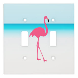 One cute pink flamingo on the beach light switch c