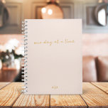 One Day at a Time | Blush Pink and Gold Script Planner<br><div class="desc">An elegant planner with handwritten script informal casual typography in gold "one day at a time" with personalized monogram in gold on a blush pink background. The perfect planner to organize your life!</div>