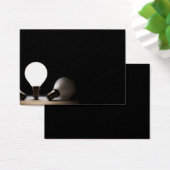 One light bulb shining in a dark space (Desk)