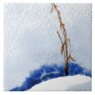 One small steam of straw in a large snow drift ceramic tile