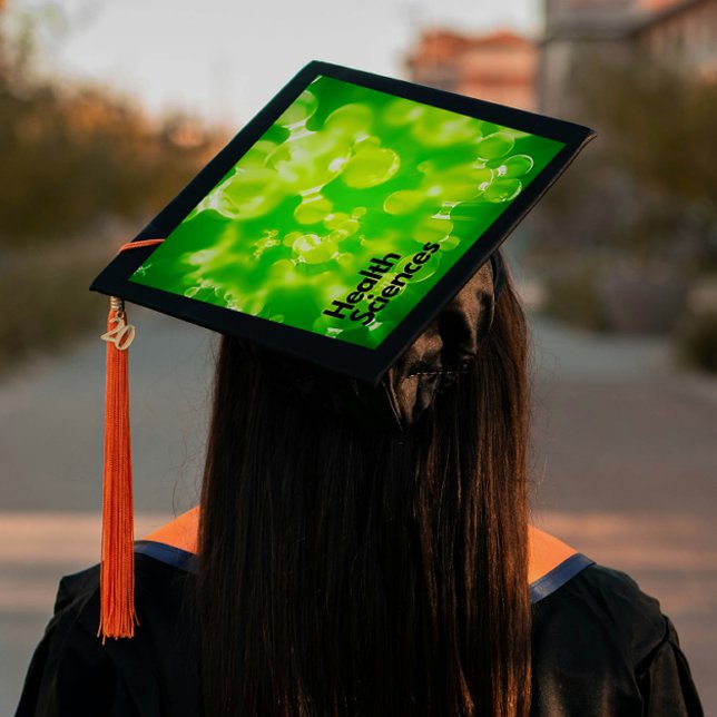 One-Step Grad Cap - Faculty - "Health Sciences"  (Introducing “Health Sciences”, Grad Lore’s bold, one step, polished peel‑and‑stick grad cap topper. )