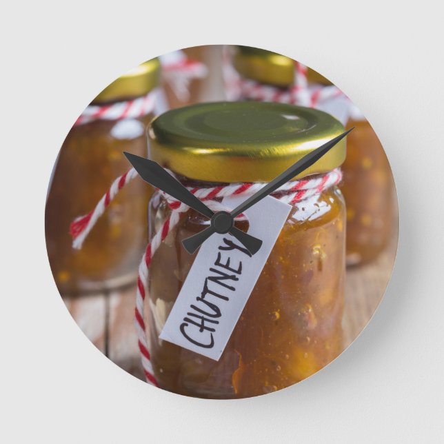 Onion pineapple chutney on rustic wood round clock (Front)