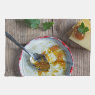 Onion pineapple chutney on rustic wood towel