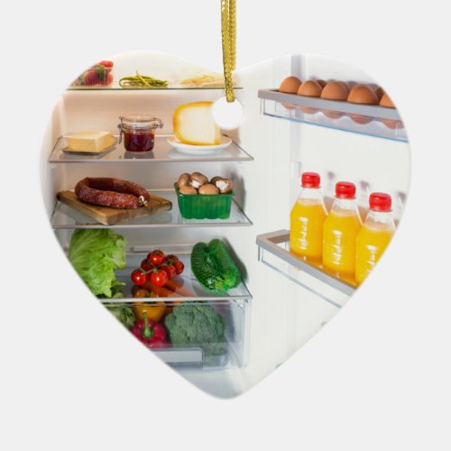 Open fridge filled with food ceramic ornament