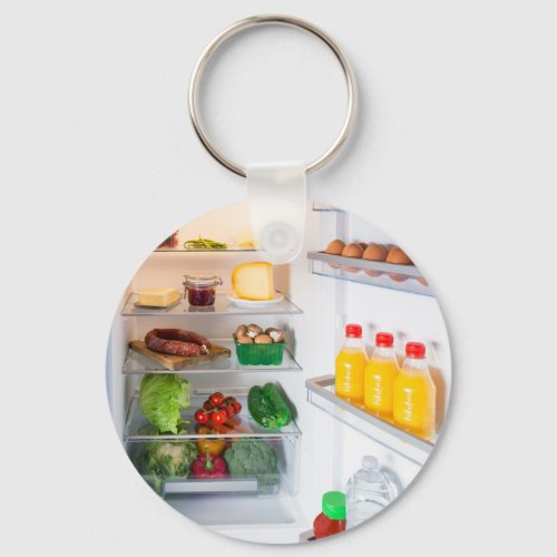 Open fridge filled with food keychain