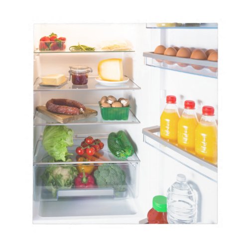 Open fridge filled with food notepad