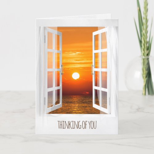 open white window with sunrise scene card