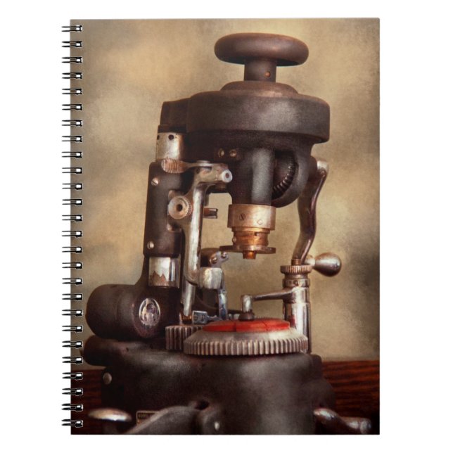 Optometry - Lens cutting machine Notebook (Front)